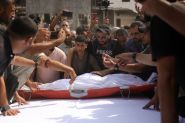 Gazans Mourn Al Jazeera Staff Killed by Israel