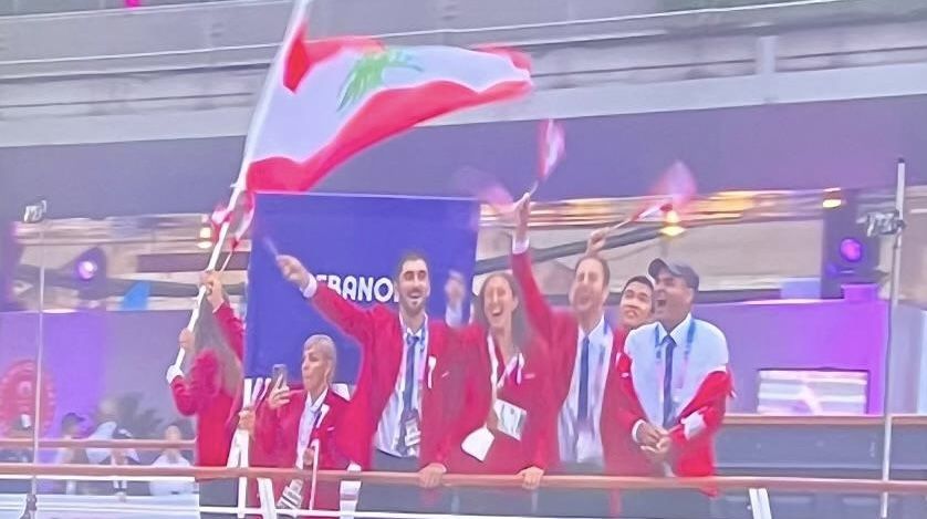 Teams Sail Down Seine in Rain-Soaked Olympics Opening Ceremony