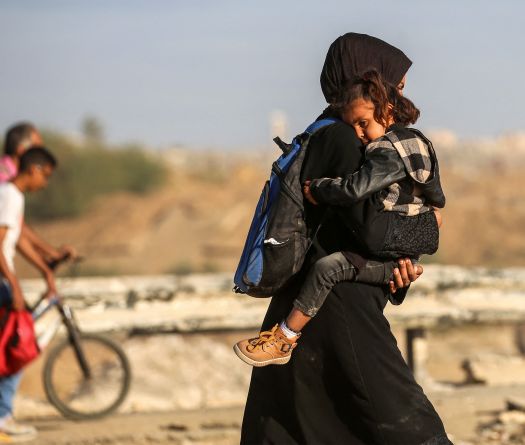 Palestinians Return to Devastated Gaza City as Truce Holds